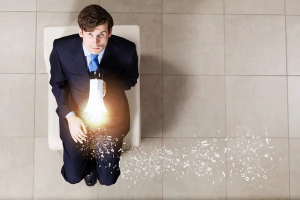 Businessman on chair — Stock Photo, Image