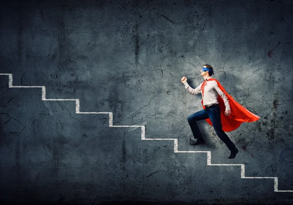 Супермен на лестнице — стоковое фото