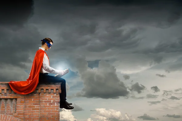 Superman with book — Stock Photo, Image