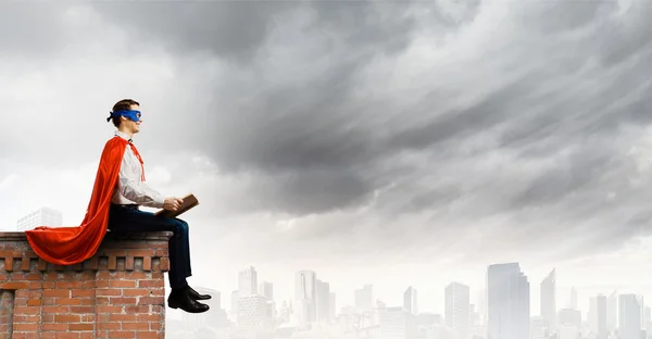 Superman with book — Stock Photo, Image