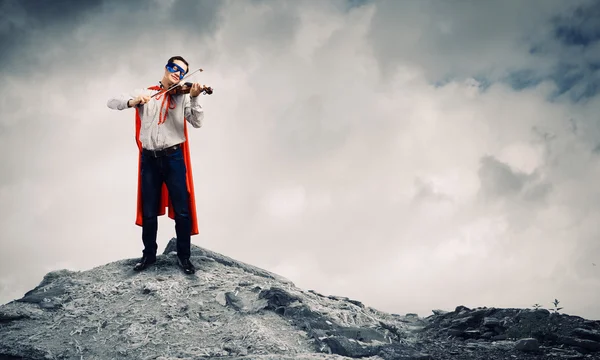 Superman with violin — Stock Photo, Image