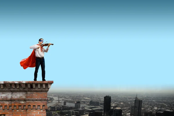 Superman with violin — Stock Photo, Image