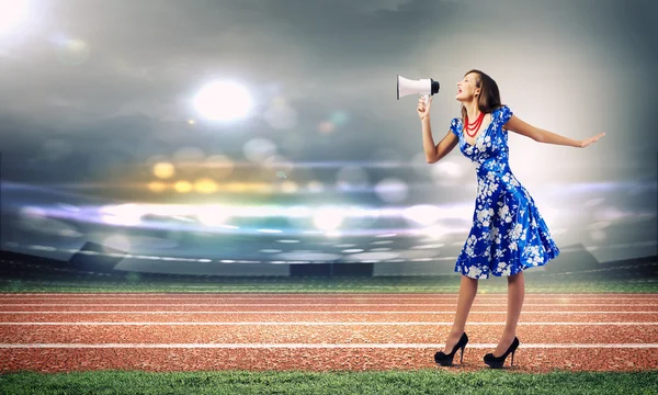 Woman with megaphone — Stock Photo, Image