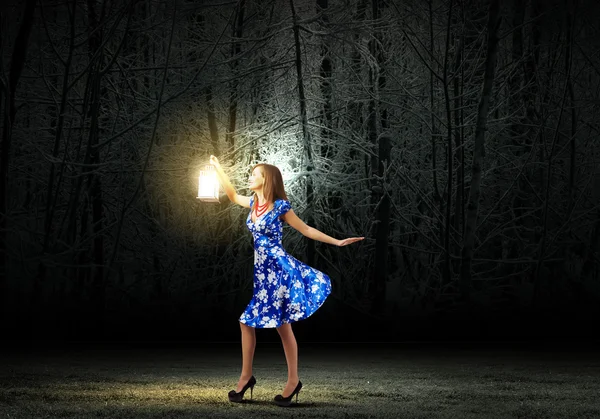 Woman with lantern — Stock Photo, Image