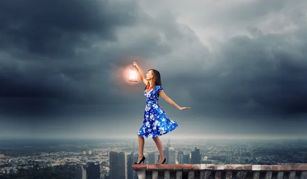 Woman with lantern — Stock Photo, Image