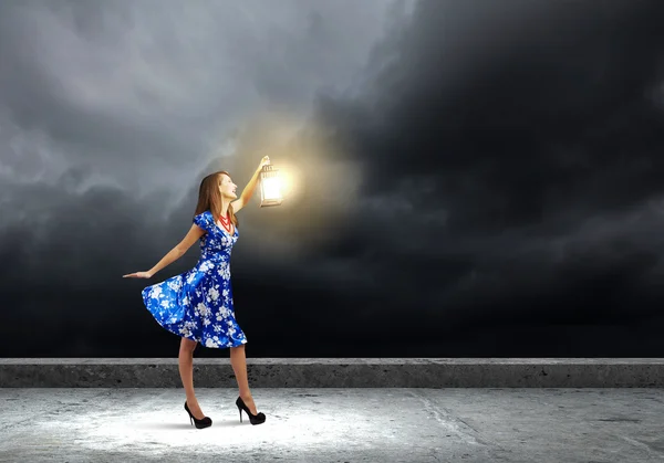 Woman with lantern — Stock Photo, Image