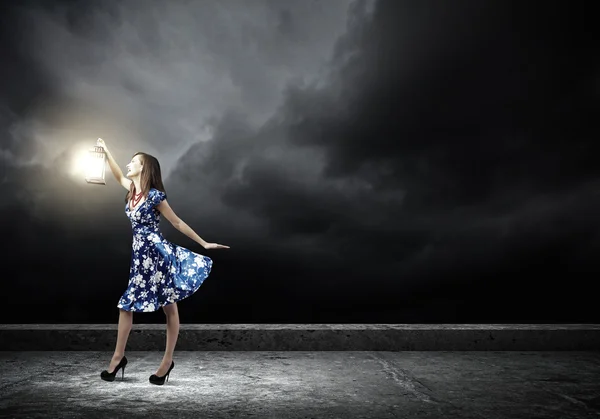 Woman with lantern — Stock Photo, Image