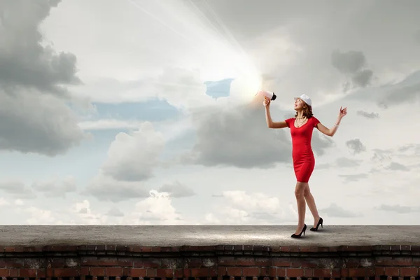 Woman with megaphone — Stock Photo, Image