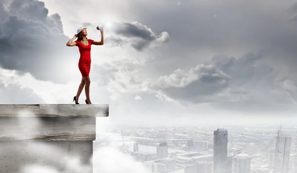 Woman with megaphone — Stock Photo, Image