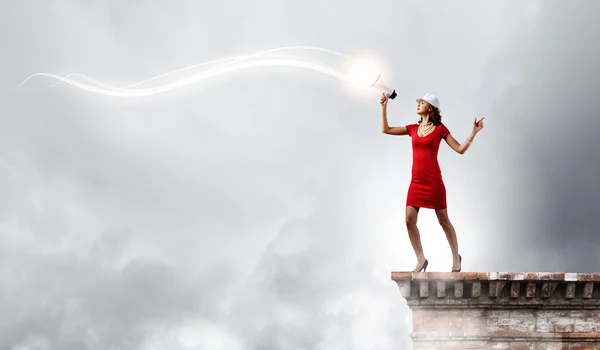 Woman with megaphone — Stock Photo, Image