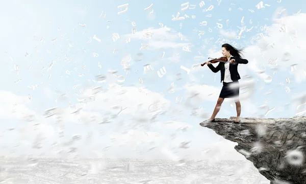 Businesswoman with violin — Stock Photo, Image