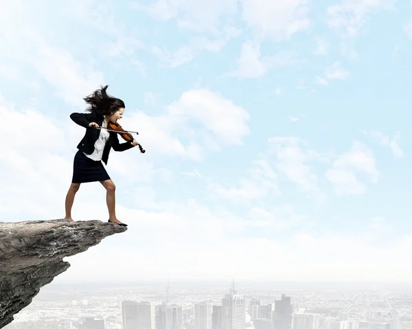 Businesswoman with violin — Stock Photo, Image