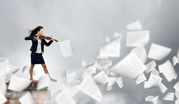Businesswoman with violin — Stock Photo, Image