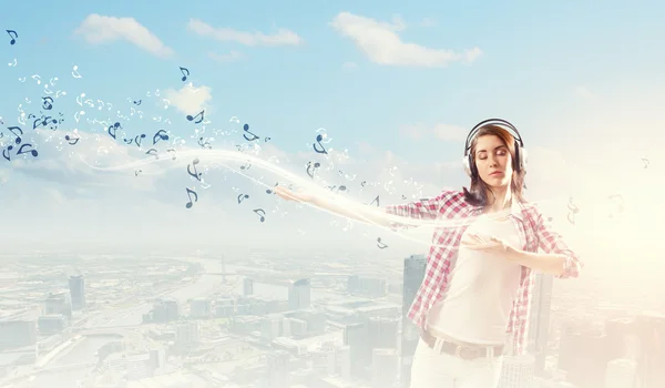 Girl with headphones — Stock Photo, Image