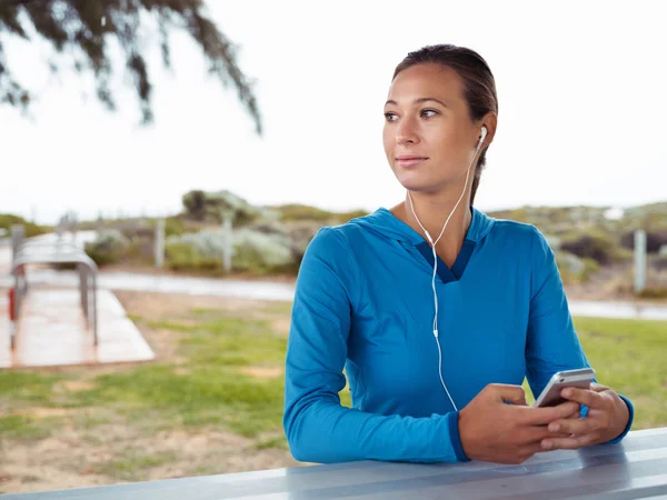 Looking for my running music — Stock Photo, Image