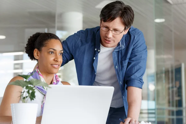 Expert is ready to help her with her work — Stock Photo, Image