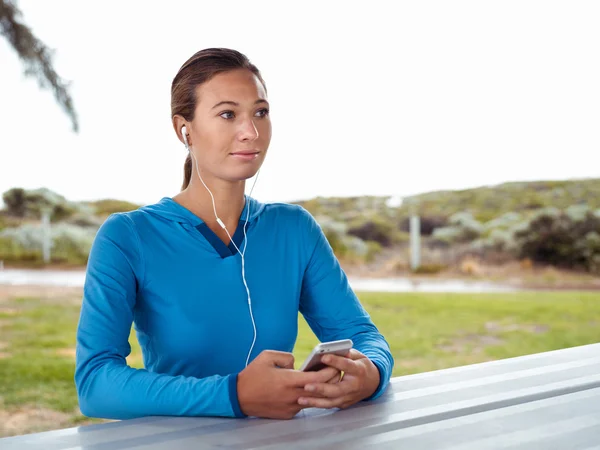 Looking for my running music — Stock Photo, Image