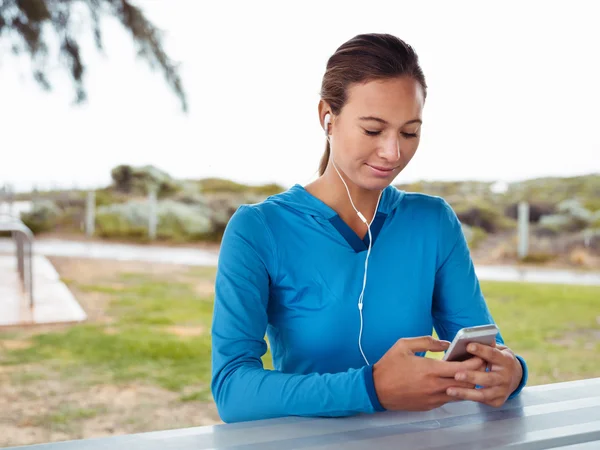 Looking for my running music — Stock Photo, Image