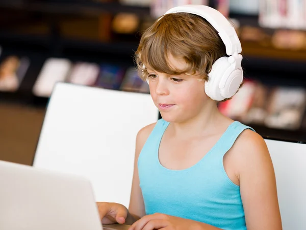 Boy spending time with notebook — Stock Photo, Image