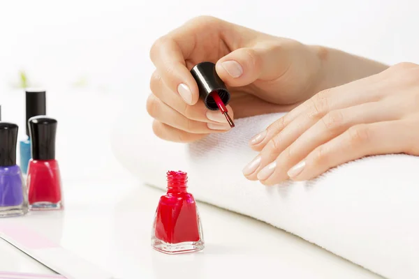 Woman applying polish — Stock Photo, Image