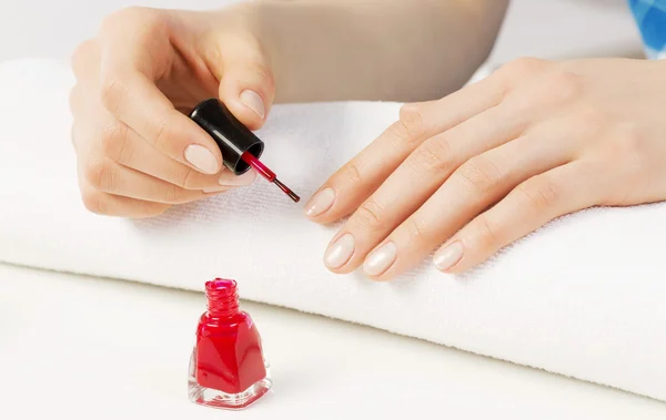 Woman applying polish — Stock Photo, Image