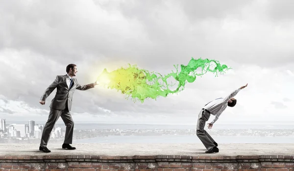 Two business people fighting with each other — Stock Photo, Image