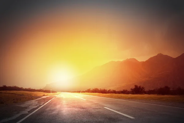 Sunset above road — Stock Photo, Image