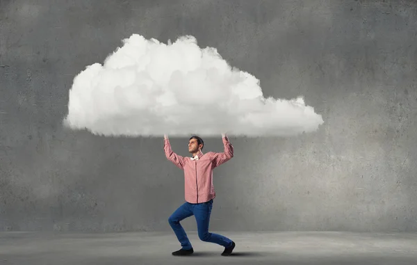 Man lifting cloud — Stock Photo, Image