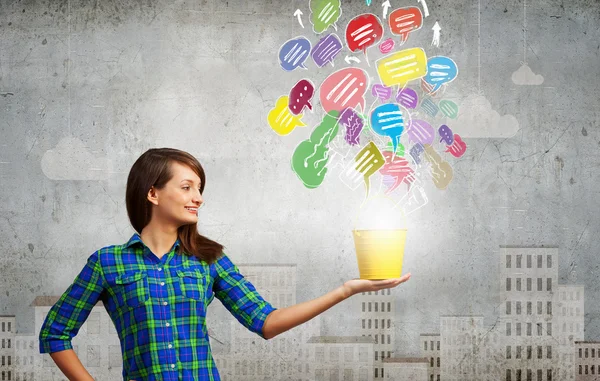 Young woman in casual with yellow bucket — Stock Photo, Image