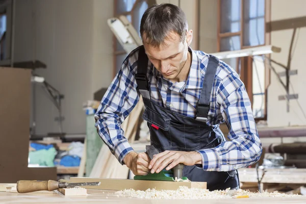 Snickare på jobbet — Stockfoto