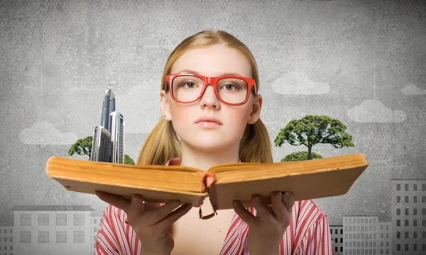 Girl excited with book — Stock Photo, Image