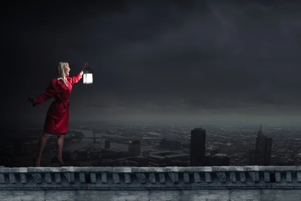 Woman with lantern — Stock Photo, Image