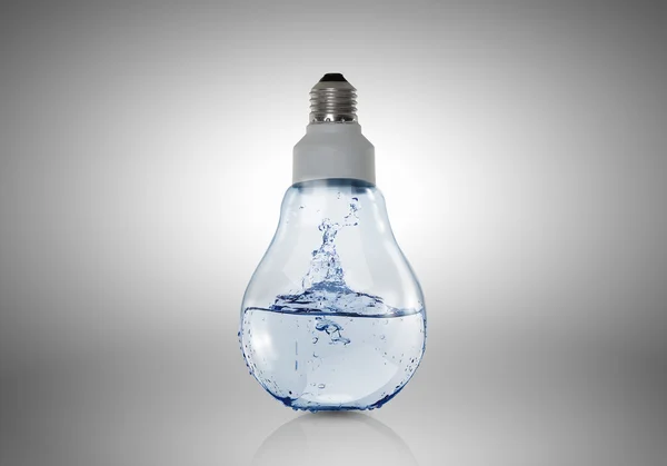 Light bulb with water — Stock Photo, Image