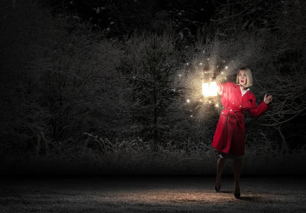 Woman with lantern — Stock Photo, Image