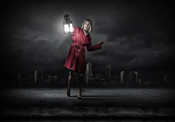 Woman with lantern — Stock Photo, Image