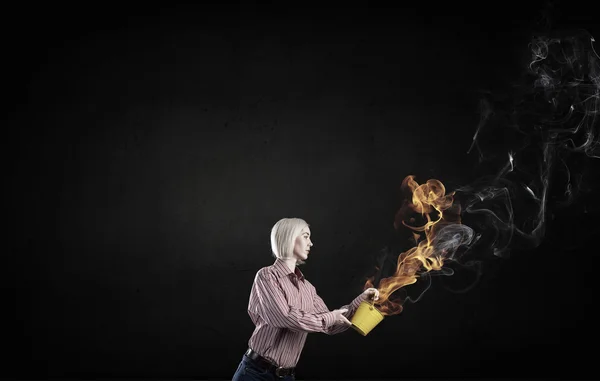 Girl splashing fire flames — Stock Photo, Image