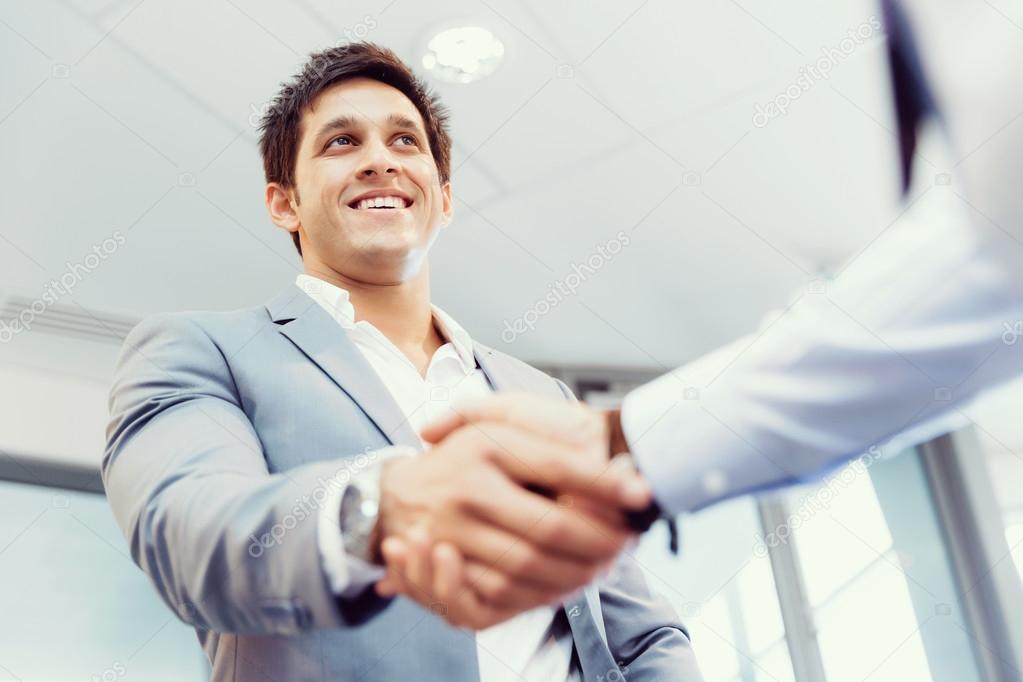Handshake of businessmenoncepts - soft focus