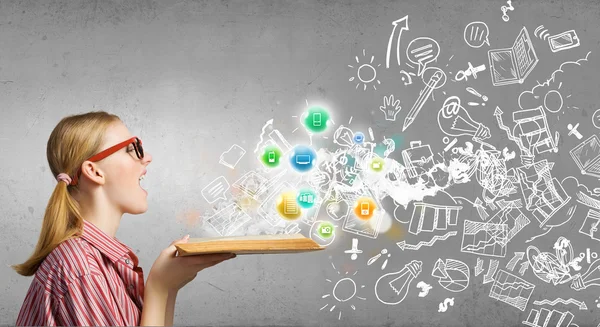 Girl excited with book — Stock Photo, Image