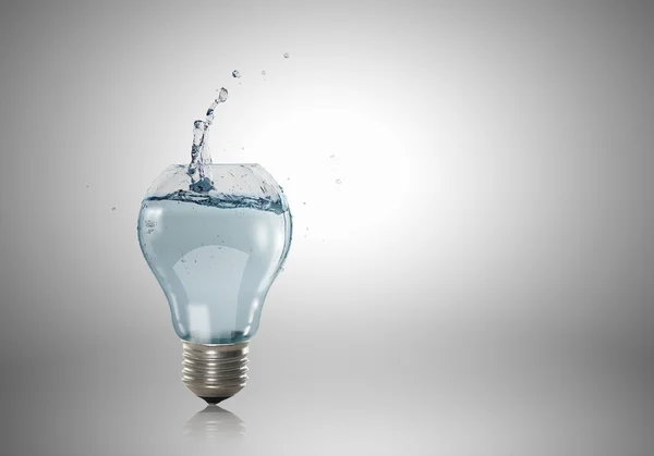 Light bulb with water — Stock Photo, Image