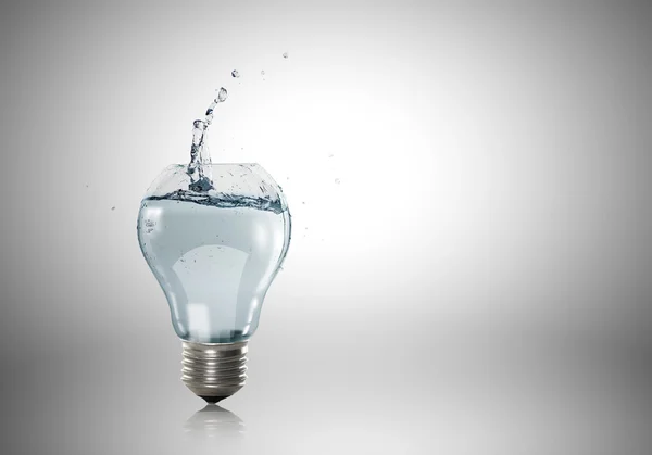 Light bulb with water — Stock Photo, Image