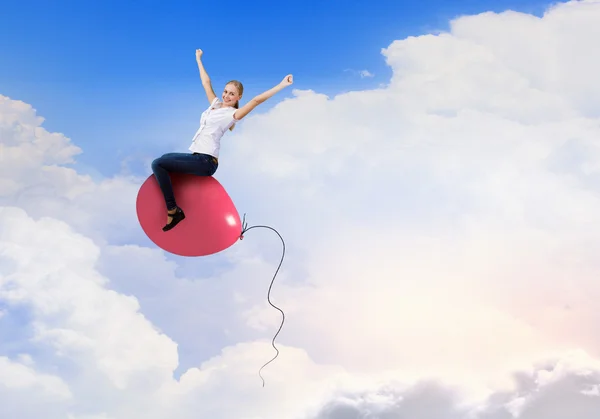 Woman riding balloon — Stock Photo, Image