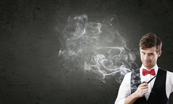 Businessman and pipe smoke — Stock Photo, Image