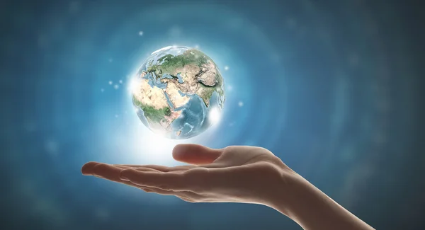 Planet in hands — Stock Photo, Image