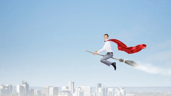 Man ride broom — Stock Photo, Image