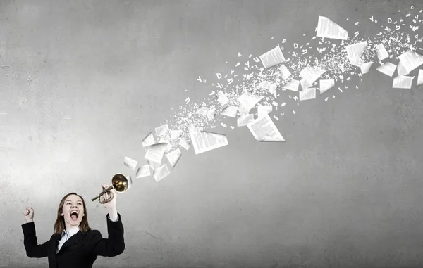 Woman speaking in horn — Stock Photo, Image