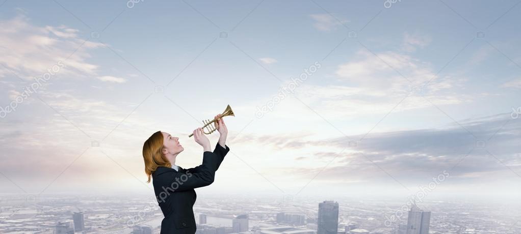 Woman speaking in horn