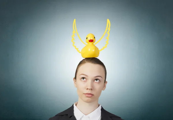 Woman with duck toy — Stock Photo, Image