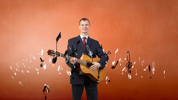 Man with guitar Stock Image