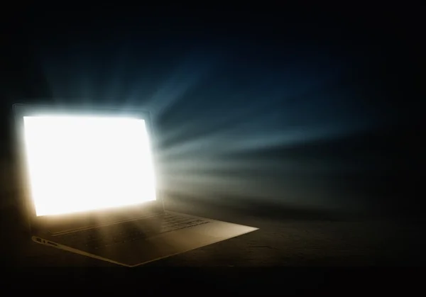 Glowing laptop — Stock Photo, Image