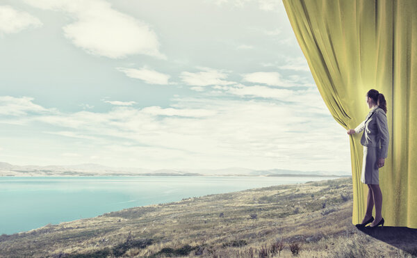 Woman open curtain